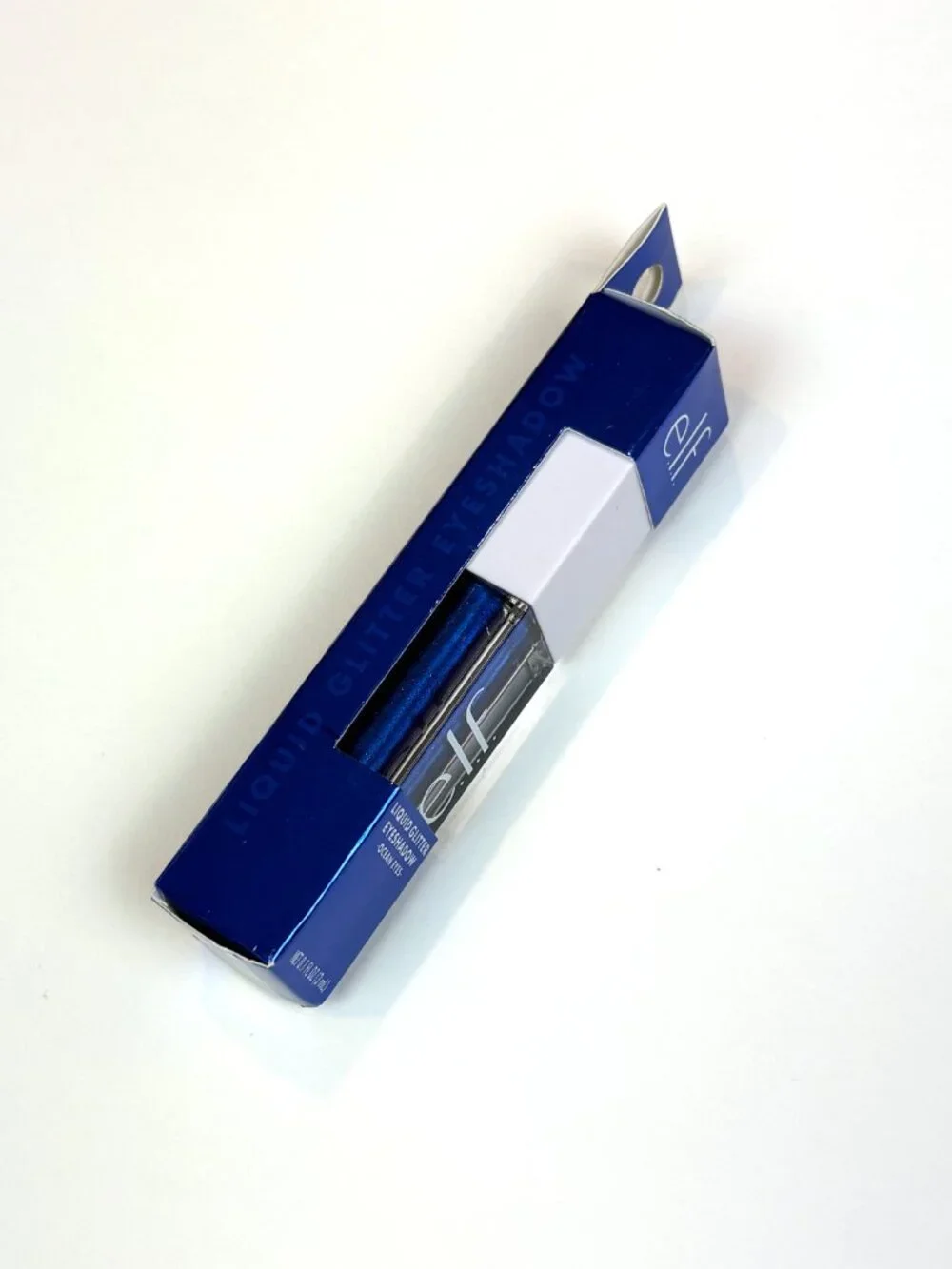 e.l.f. Cosmetics Liquid Glitter Eyeshadow Ocean Eyes - Deep royal blue. New
